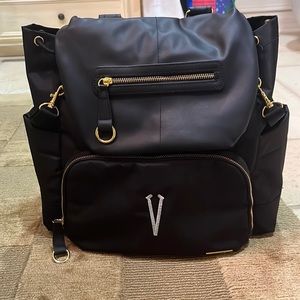 Skip Hop black monogrammed diaper bag